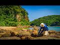 A Seaside Man Who Fishes With $0 Bait