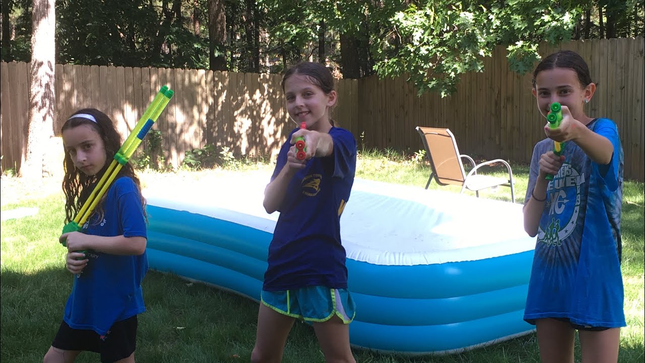 We turned our backyard into a battle field. Epic water gun fight YouTube