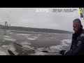 New York police rescue injured bald eagle floating on ice