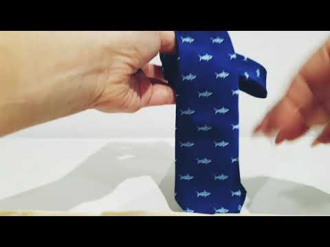 Video: Maneras sencillas de colgar corbatas en un armario: 8 pasos (con imágenes)