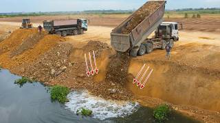 Incredible!! extreme caution by KOMATSU Dozer experts pushing rocks into deep lake to build new road