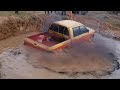 Flooded Mitsubishi L200 in Off Road Mud Hole