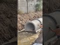 Take out steel panel from the water by excavator