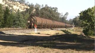UP 8351 empty oil cans north [XQ]