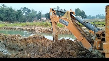 Case Jcb video, soil loading in tractor, Village Culture