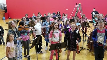 Fourth Grade Orchestra Singing then Performing Button You Must Wander