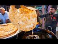 Indian street food  giant paratha and halwa srinagar kashmir india