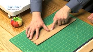 www.FonsandPorter.com: In this video, we show you how to add a hanging sleeve to your quilt is easy. Follow these easy 