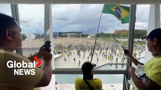 Pro-Bolsonaro protesters storm Brazilian government buildings