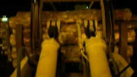 unloading log rail caterpillar 988f