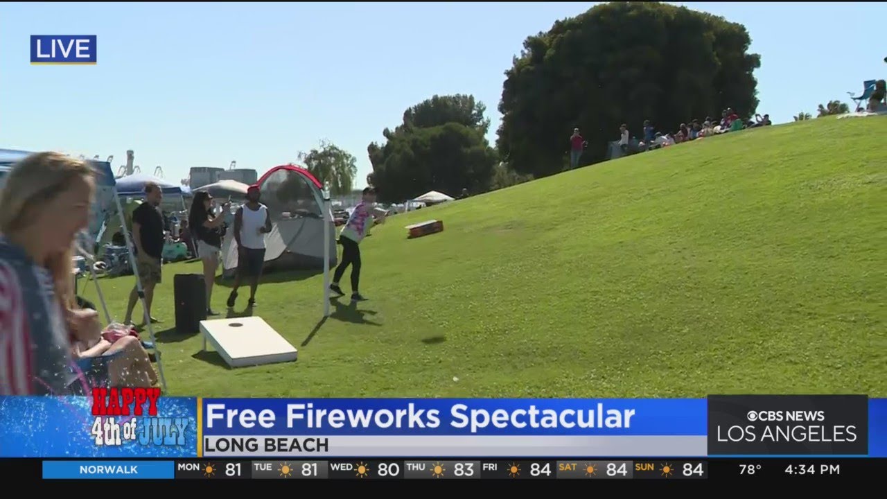 Onlookers get ready for the 4th of July extravaganza along Long Beach