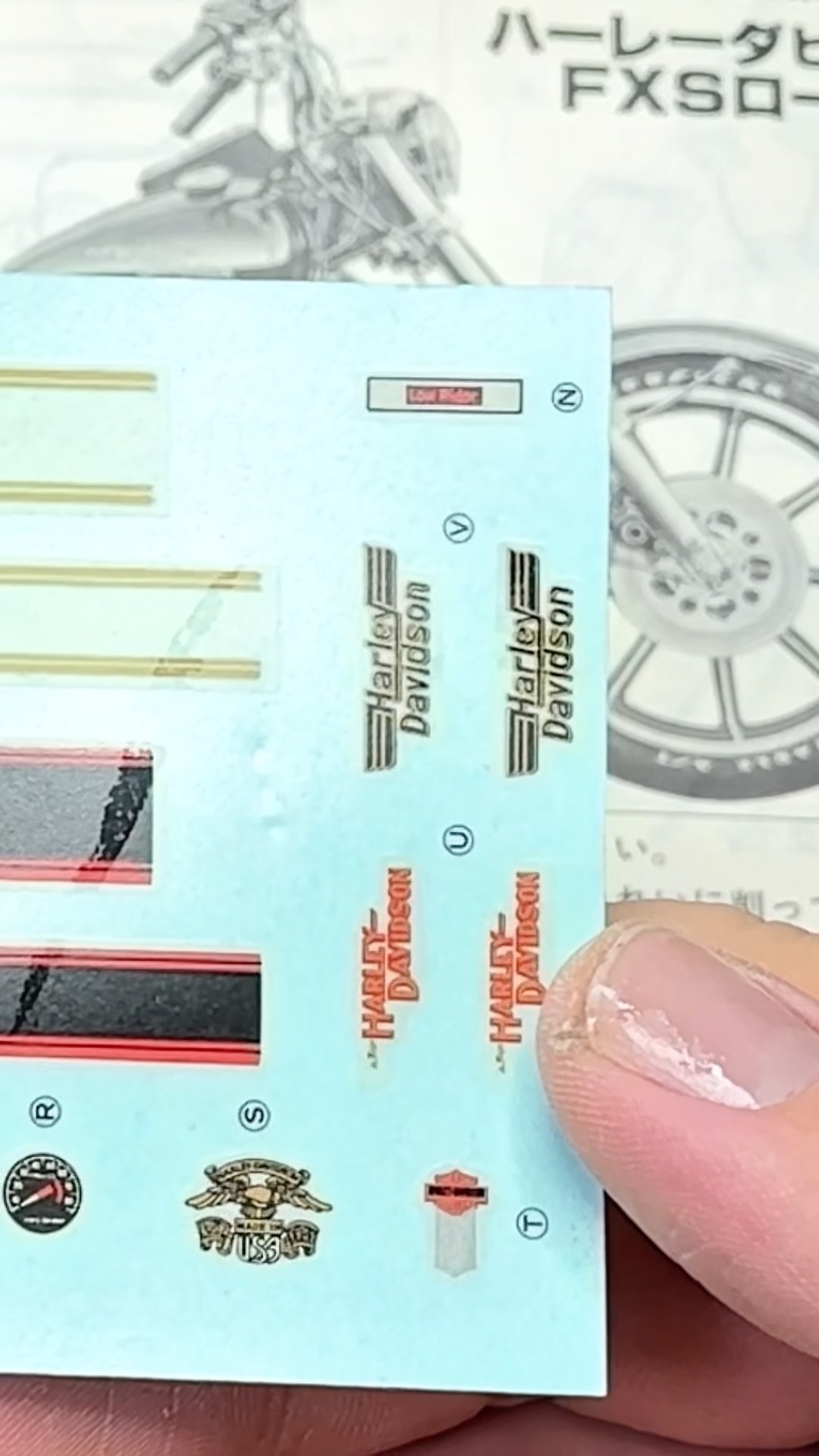 If the decals are yellowed, you can take them out of the box and