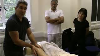 Hot stone massage  lower limb  prone