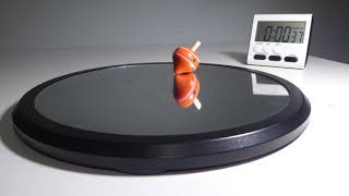 Orange Wooden Top Doesn't Sleep. Falls at 0:34. Rocks to 1:08