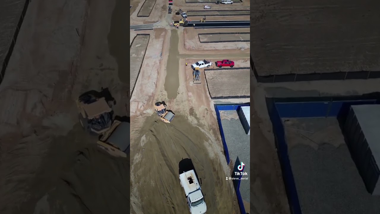 Grading dirt and laying asphalt in Murrieta California