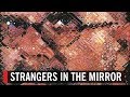 Strangers in the Mirror