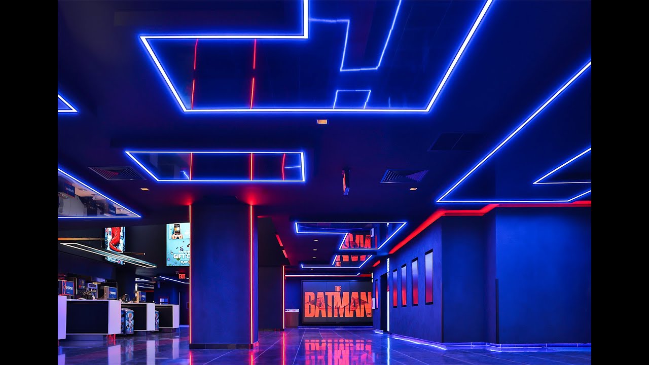 Starry sky stretch ceiling Installation at Regal movie theater. High gloss, linear light, starry sky