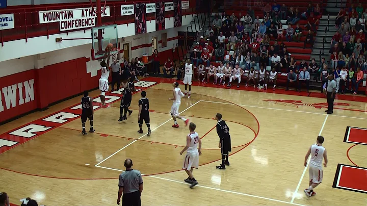 Erwin's #40 Jeremiah Jackson with a Slam Dunk agai...