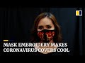 Vietnamese designer embroiders face masks to encourage people to cover up for Covid-19 fight