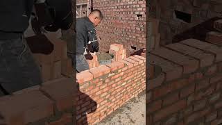 Skilled Construction Worker Making Brick Wall