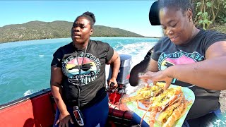 Captain Queen Stephanie sailing on the ocean creative Bush cooking boiled garlic butter Lobster