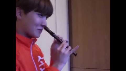 j-hope playing the recorder with his nose