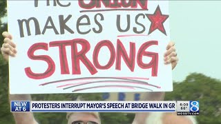 Protesters Interrupt Start Of Bridge Walk