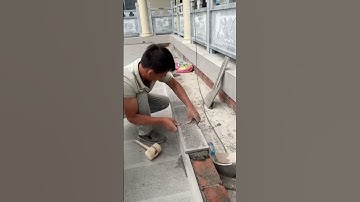the process of installing long ceramic tiles on red bricks in the yard #construction #popular #short