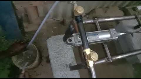 Pneumatic water pumping system