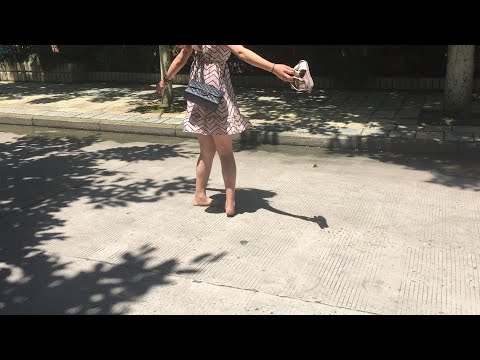 Yiou went barefoot in the hot summers, leaving his soles dirty and red