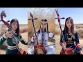 Traveling in mongolia mongolian girl mongolian girl plays the national musical instrument matouqin