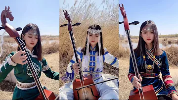 【Traveling in Mongolia】 Mongolian girl Mongolian girl plays the national musical instrument matouqin