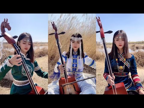 【Traveling in Mongolia】 Mongolian girl Mongolian girl plays the national musical instrument matouqin