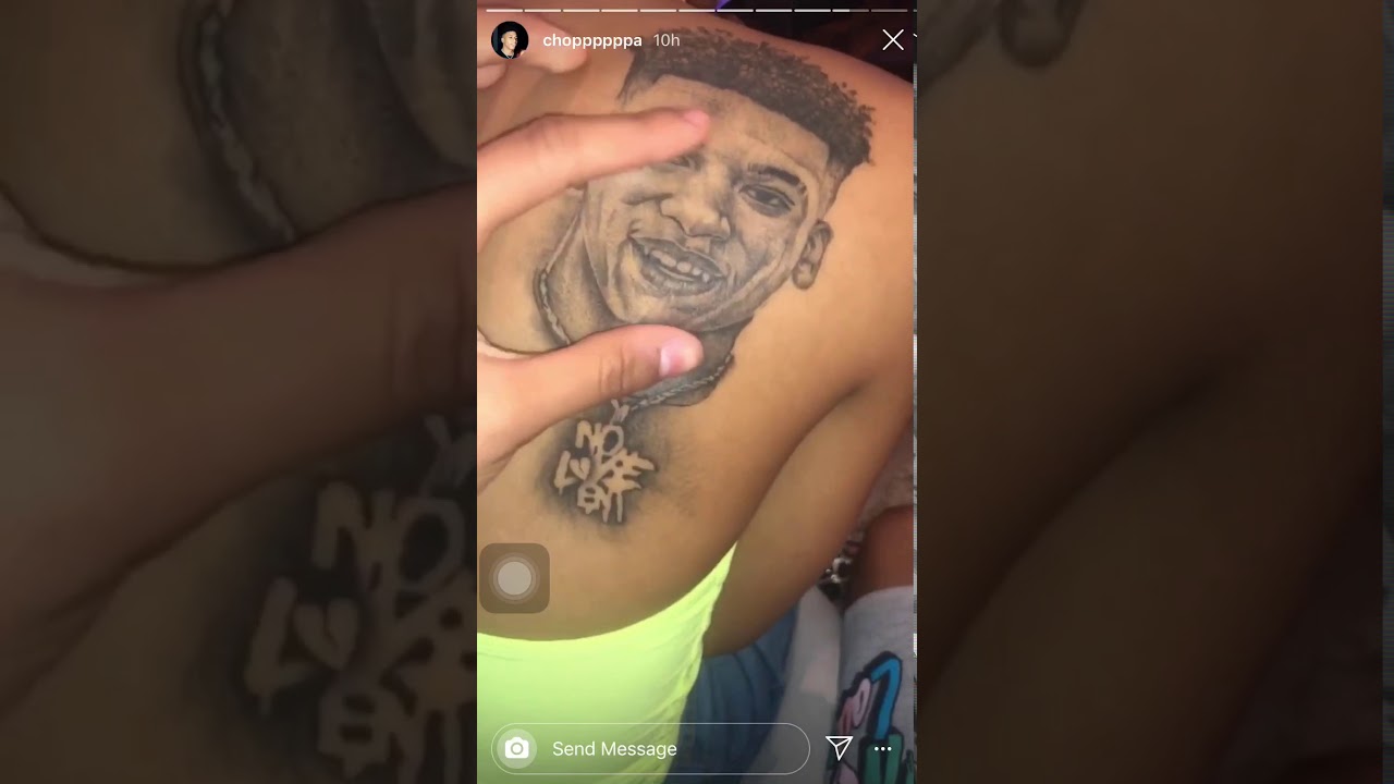 Nle Choppas Girlfriend Got A Tattoo Of Choppa On Her Back Youtube