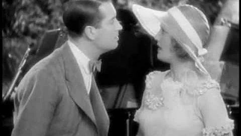 Maurice Chevalier singing "Mimi" to Jeanette MacDo...