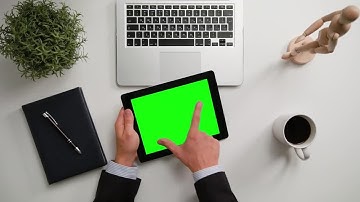 Man On A IPad With A Green Screen Stock Video