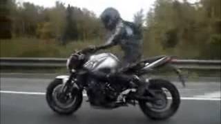 Crazy guy doing insane stunts on bike flv
