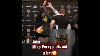 Mike Perry pulls out a bat at press conference! 😳