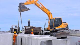 Massive River Bridge Project: Heavy Excavator Places Giant Concrete Units!
