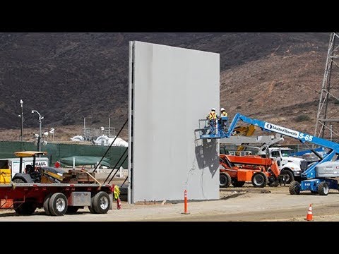Prototype for Donald Trump's border wall under construction - YouTube