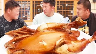 F3 rehearses the wedding dance in northern Shaanxi. A chicken with pepper supplements its physical