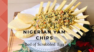 NIGERIAN YAM CHIPS ON A BED OF SCRAMBLED EGG