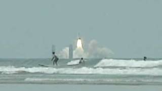 NASA FUSE rocket launch with surfer