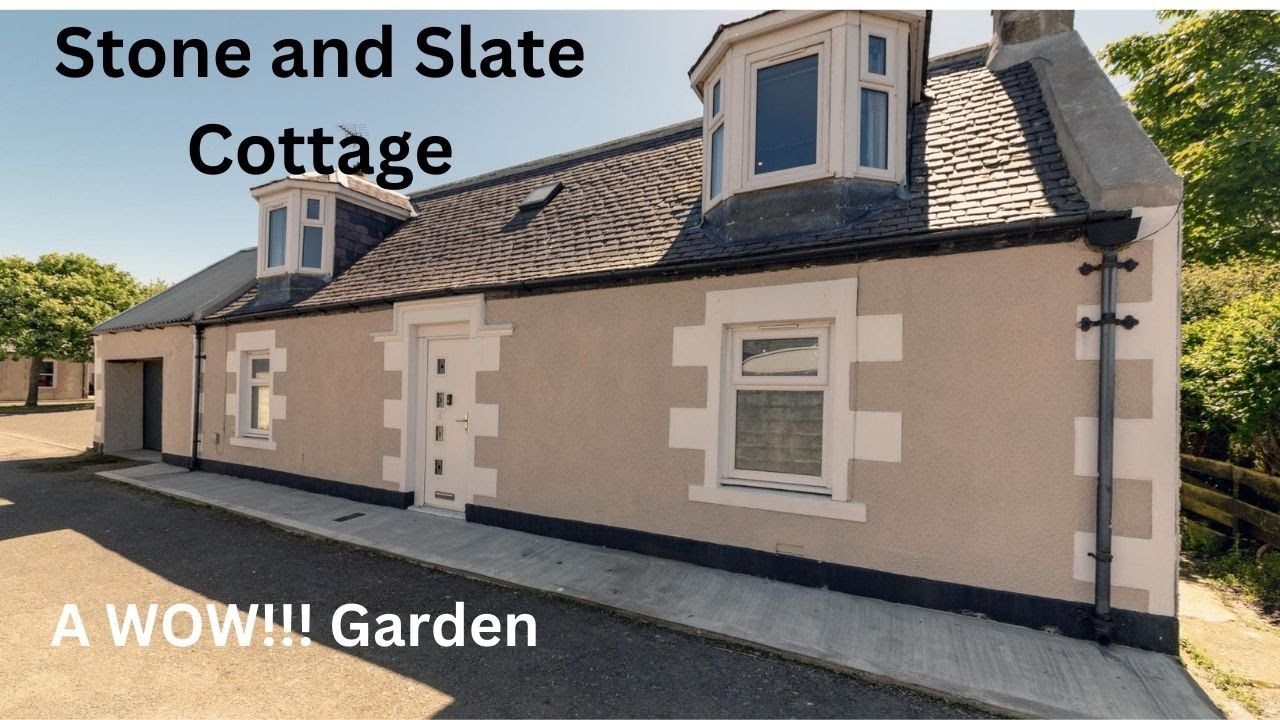 A Traditional Stone and Slate 3 Bedroom Detached Cottage with Garage and a WOW garden.  £195,000