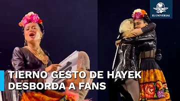 Hayek tiene amoroso gesto con fan durante concierto de Madonna