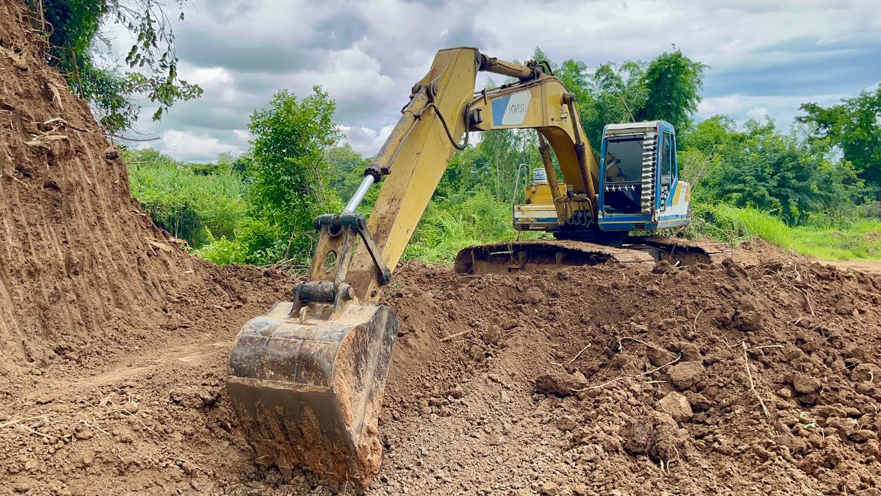 ห่างหายกันไปนานกับทีมงานเสี่ยต้น KOBELCO SK200-1 ทีมงานนี้ยังมีบ่อดินใสช่วงหน้าฝน