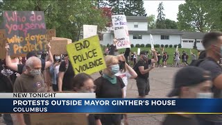 Protesters gather at Mayor Ginther's house