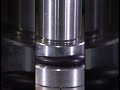 Industrial Wax Slowly Deforming Under Hydraulic Press
