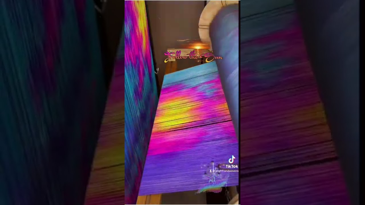 Follow the Sun silk Beaming onto an AVL loom