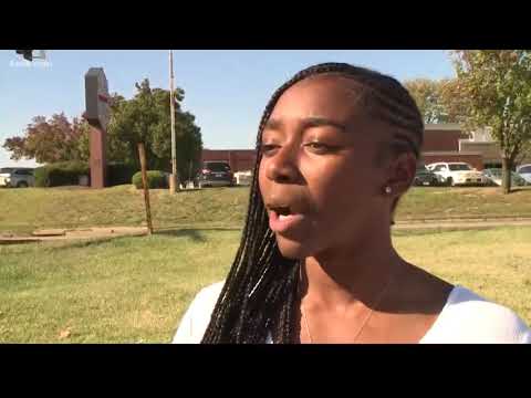Students show support for fired coach